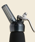 Closeup of CreamRight black one pint whipped cream dispenser