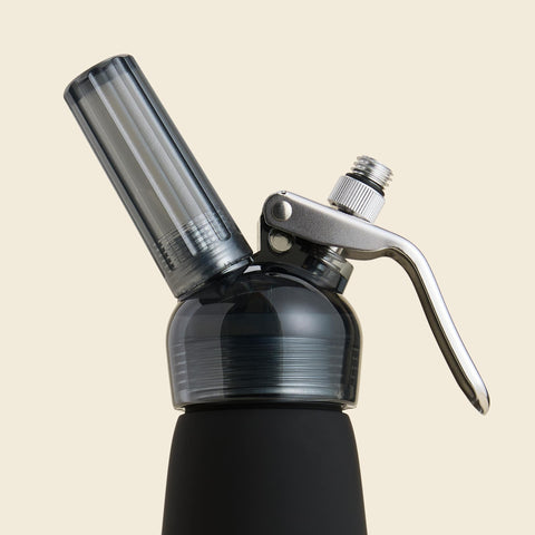 Closeup of CreamRight black one pint whipped cream dispenser