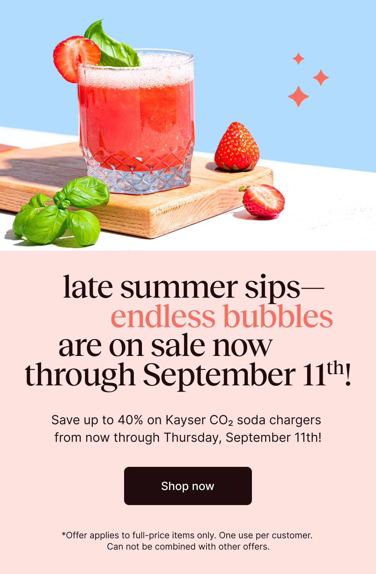 Sparkling drink with strawberries and basil on a wooden board against a blue background, with promotional text on the right.