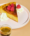 Slice of custard pie with whipped cream